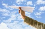 Hand With Paper Plane Stock Photo