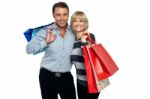 Husband And Wife Enjoying Shopping Stock Photo