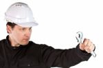 Handyman Wearing Uniform And Hardhat Stock Photo