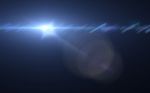 Lens Flare Or Star Flare In Black Background.modern Nature Flare Effect With Black Background For Overlay Design Stock Photo