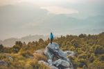 Instagram Filter Young Man Asia Tourist At Mountain Is Watching Over The Misty And Foggy Morning Sunrise, Travel Trekking Stock Photo