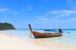 Boat On The Beach With Blue Sky Stock Photo