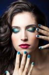 Sexy Beauty Girl With Red Lips And Blue Nails Stock Photo