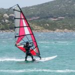 Windsurfing At Porto Pollo In Sardinia Stock Photo