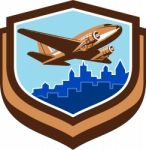 Vintage Airplane Take Off Cityscape Shield Retro Stock Photo