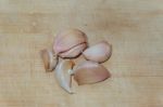 Garlic On Cutting Board Stock Photo