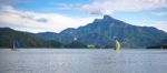 Yachts Sailing On Lake Mondsee In Austria Stock Photo