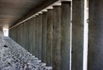 Empty Corridor Of Concrete Columns Stock Photo