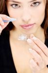 Woman Holding Contact Lens Stock Photo