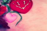 Pink Heart-shaped And Jewelry In Red Velvet Box Stock Photo