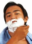 Young Man Shaving Stock Photo