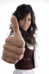 Young Model With Thumbs Up Hand Gesture Stock Photo