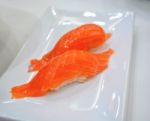 Nigiri Sushi On White Plate At Japan Restaurant Stock Photo