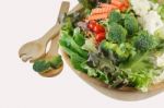 Salad On Wooden Bowl Stock Photo