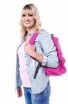 Young Blonde Woman With Backpack Stock Photo