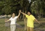 Portrait Of Happy Family In Park Stock Photo