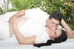 Attractive Young Caucasian Pregnant Couple In The Park Stock Photo