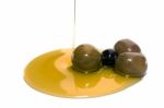 Green And Black Olives With Olive Oil Stock Photo