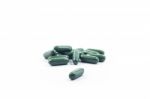 Green Capsule Pills On White Background Stock Photo