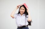 Asia Thai High School Student Uniform Beautiful Girl Read A Book Stock Photo