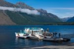 Boats Moored To A Jetty In Lake Mcdonald Stock Photo
