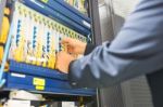 People Fix Node Fiber Optic In Network Room Stock Photo