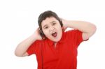 Young Boy Listening To Music Stock Photo