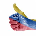 Venezuela Flag On thumb up Hand Stock Photo