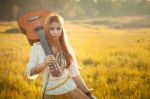 Hippie Woman Walking In Golden Field Stock Photo