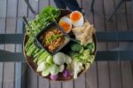 Chili Paste Mixed With Crabmeat , Vegetable , Fried Snake Skin Gourami  And   Boiled Egg  , Crab's Spawn Chili Sauce Stock Photo