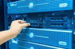 Man Fix Server Network In Data Center Room Stock Photo