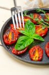 Baked Cherry Tomatoes With Basil Anf Thyme Stock Photo