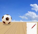 Soccer Ball And Blue Sky Stock Photo