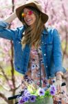 Beautiful Young Woman With A Vintage Bike In The Field Stock Photo