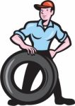 Tireman Mechanic With Tire Cartoon Isolated Stock Photo