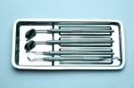 Dental Tools On Plate Stock Photo