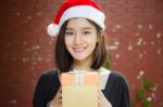 Portrait Of Thai Adult Student University Beautiful Girl Hold Gift Box In Hands Stock Photo