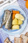 Mackerel Fish With Potato And Carrot Stock Photo