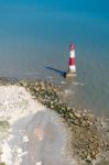 Beachey Head, Sussex/uk - July 23 : View Of The Lighthouse At Be Stock Photo