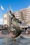 David Wayne Sculpture "girl With The Dolphin" Next To Tower Brid Stock Photo