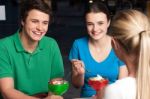 Friends Enjoying Meal Outdoors Stock Photo