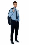 Young Businessman Holding Jacket Stock Photo