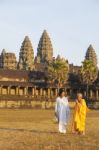 Two Unidentified Buddhist Female Monks Dressed In Orange And Whi Stock Photo