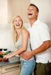 Couple In The Kitchen Stock Photo