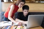 Young Studying Friends Doing Homework Task For Lecture Stock Photo