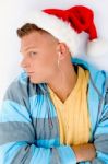 Man Wearing Christmas Hat Stock Photo