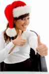 Christmas Lady Showing Thumb Up Stock Photo