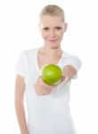 Female Giving Green Apple Stock Photo