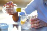 Beautiful Young Woman Drinking Soda In A Restaurant Terrace Stock Photo