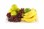 Fresh Mixed Fruit In Plate On White Background Stock Photo